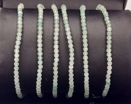 Set of 3 star cut green aventurine bracelets with adjustable strings, promoting prosperity and stylish elegance.