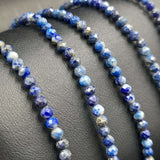 Set of 3 Star Cut Faceted Lapis Lazuli bracelets featuring deep blue beads and golden pyrite, adjustable for comfort.