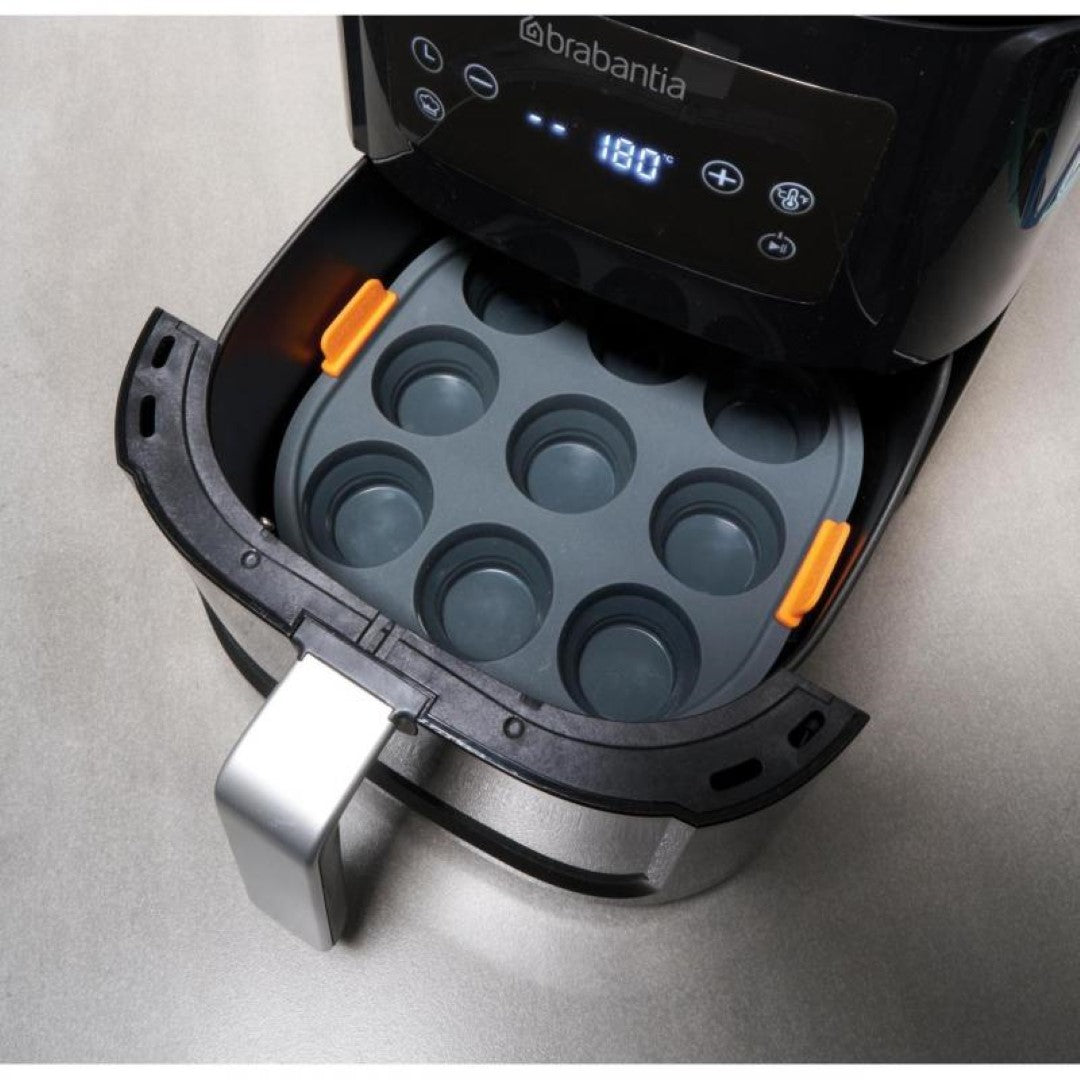 BAKEMASTER silicone air fryer insert with reinforced steel frame, perfect for baking mini frittatas, cupcakes, and muffins.