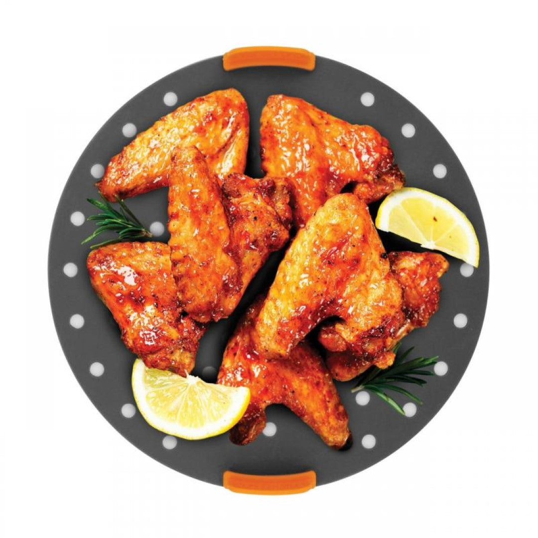 Round silicone air fryer liner with perforated design, easy-lift tabs, for non-stick cooking and hassle-free cleanup.