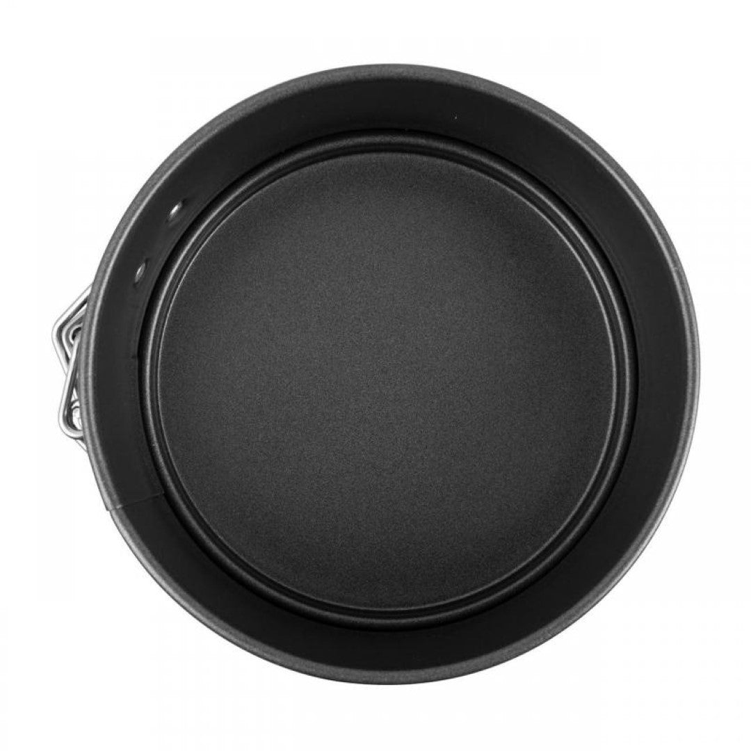 Mini round springform pan for baking individual desserts, featuring non-stick coating and durable carbon steel construction.