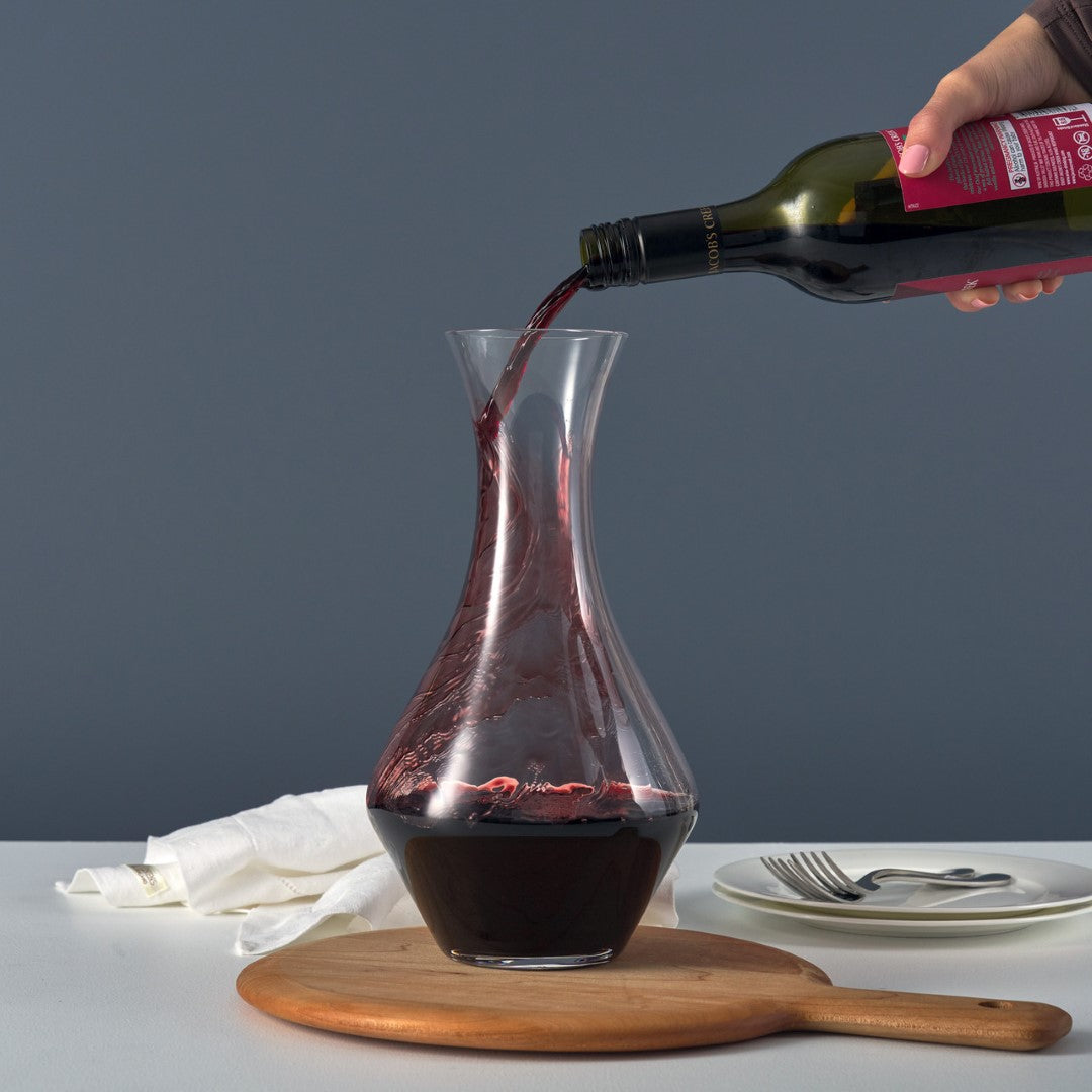 Elegant Wilkie Brothers Argyle glass decanter, 1200ml, enhances wine flavors and aromas with a modern design and effortless pour.