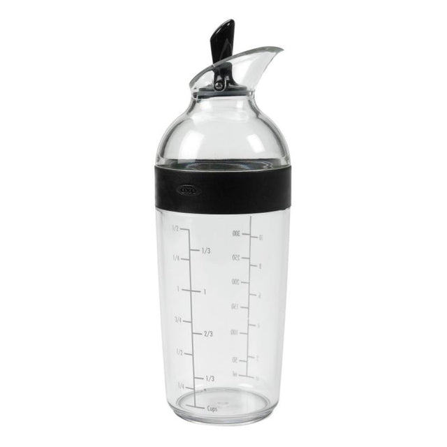 Black OXO Good Grips Salad Dressing Shaker with measurement markings, ideal for mixing and storing dressings and sauces.