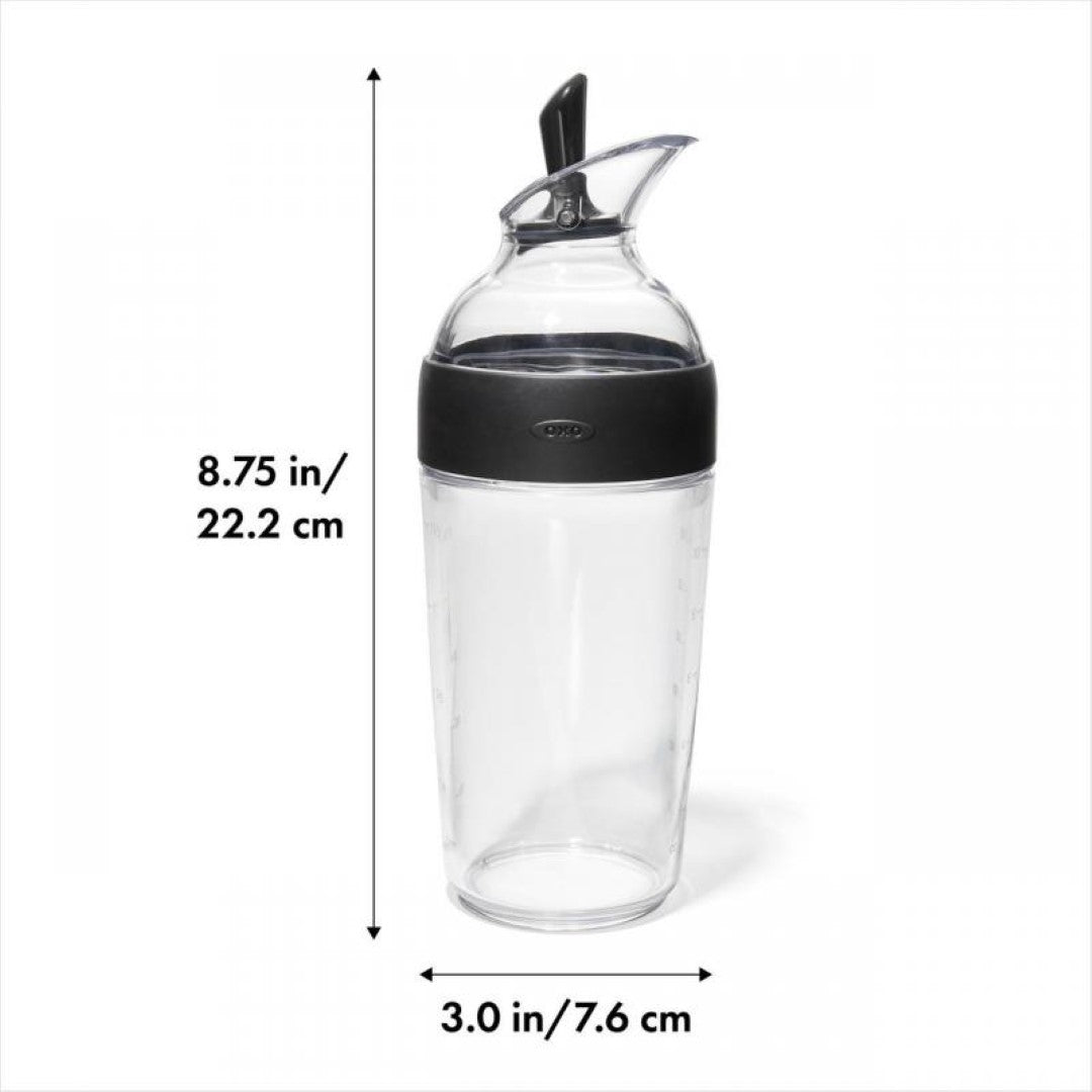 Black OXO Good Grips Salad Dressing Shaker with measurement markings, ideal for mixing and storing dressings and sauces.