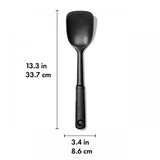 OXO Good Grips Nylon Sauté Spoon with a shallow scoop, flat edge, and non-slip handle, designed for safe non-stick cooking.