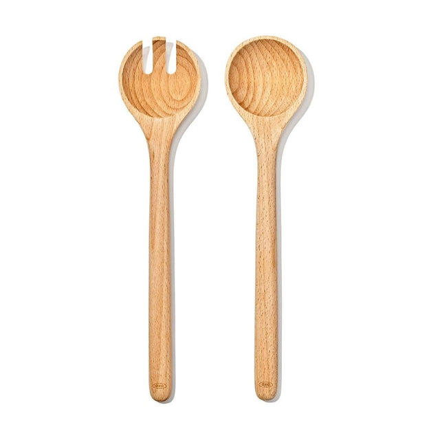 Two-piece beechwood salad servers featuring curved heads, spaced tines, and smooth handles for easy serving and storage.