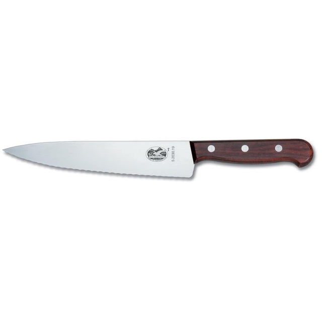 Victorinox 19cm wavy edge carving knife with wooden handle, ideal for precise slicing of meats and joints.