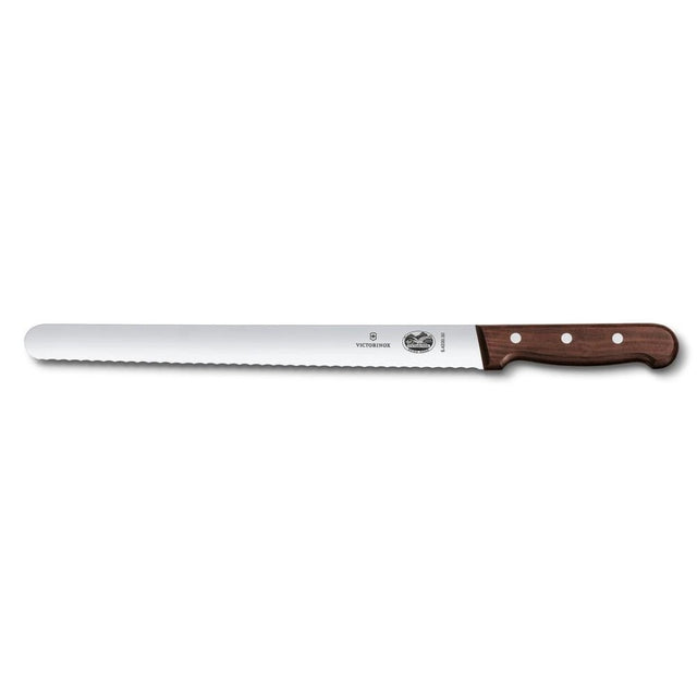 Victorinox 30cm slicing knife with wavy edge and ergonomic wooden handle for precise cutting of meats, cakes, and fruits.