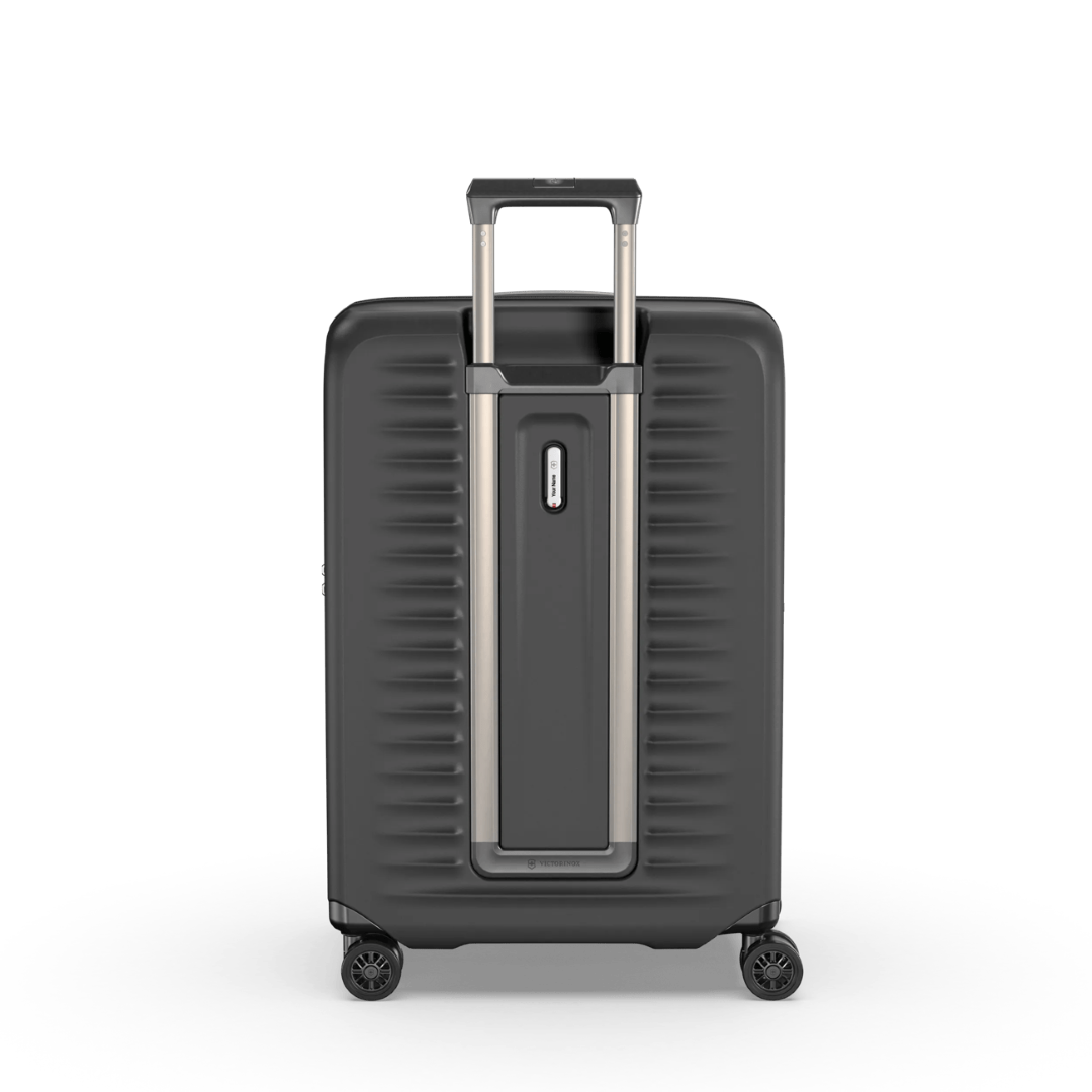 Sleek black VICTORINOX Airox Advanced Medium Hardside Case with expansion system and elastic compression straps for secure travel.