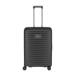 VICTORINOX Airox Advanced Medium Hardside Case in black, featuring elastic compression straps and an expansion system for extra packing space.