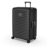 Hardside black suitcase with elastic straps, expansion system, and 4 dual caster wheels for flexible travel.