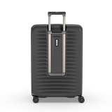 Hardside black suitcase with 4 dual wheels, expandable from 103L to 119L, featuring elastic compression straps for organization.