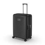 Hardside black suitcase with expandable system, compression straps, and lightweight design for effortless travel.