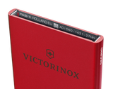 Red aluminum Essential Card Wallet by VICTORINOX, storing 4-6 cards with RFID protection and quick-access sliding system.