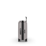 Lightweight white hardside carry-on suitcase with expandable capacity, anti-scratch pocket for devices, and smooth-rolling wheels.