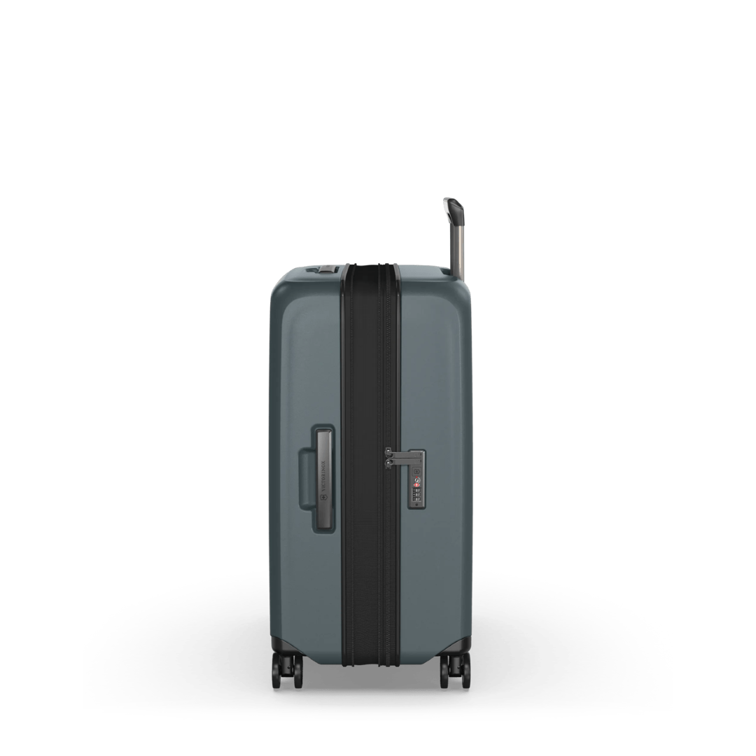 Sleek green VICTORINOX Airox Advanced Medium Hardside Case with expandable capacity and secure compression straps.