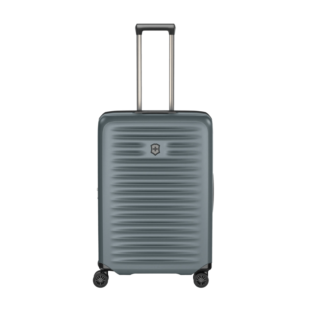 Lightweight VICTORINOX Airox Advanced Medium Hardside Case in Storm, designed for seamless travel with expandable capacity and secure straps.