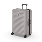 Sleek white VICTORINOX Airox Advanced Medium Hardside Case with 4-wheel spinner, expandable capacity, and secure compression straps.