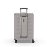 White VICTORINOX Airox Advanced Medium Hardside Case with expansion system, dual-tube handle, and 4-wheel spinners.