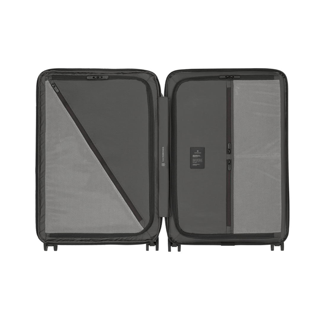 White VICTORINOX Airox Advanced Medium Hardside Case with 75L capacity, expansion system, and 4 spinner wheels for easy travel.