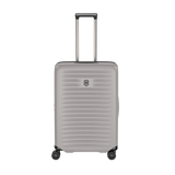 Sleek white VICTORINOX Airox Advanced Medium hardside case, featuring compression straps and expandable capacity for versatile travel.