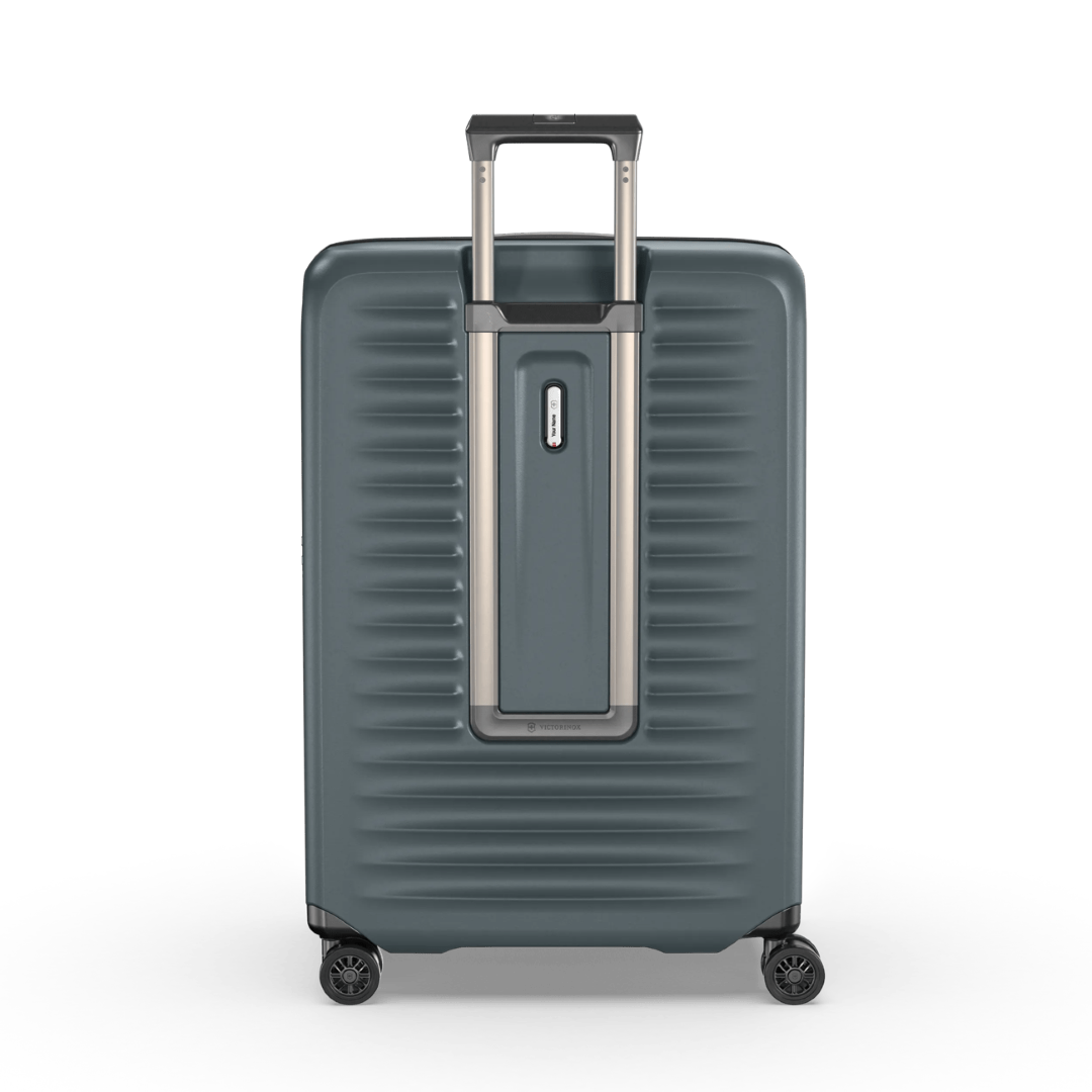 VICTORINOX Airox Advanced Large Hardside Case in Storm, 119L capacity, durable polycarbonate, with dual wheels and compression straps.