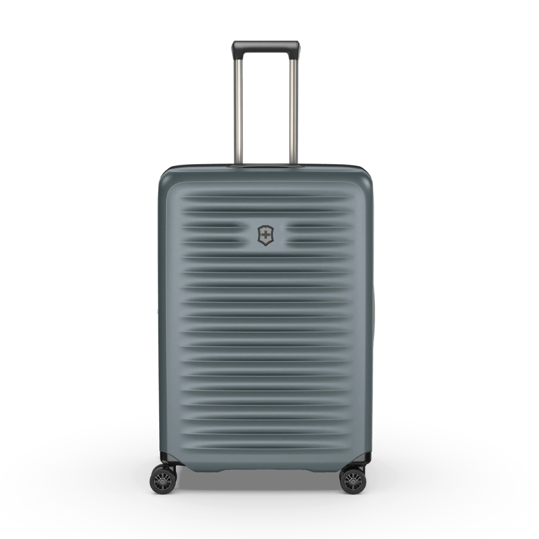 VICTORINOX Airox Advanced Large Hardside Case in Storm, lightweight green polycarbonate with expandable capacity and secure straps.