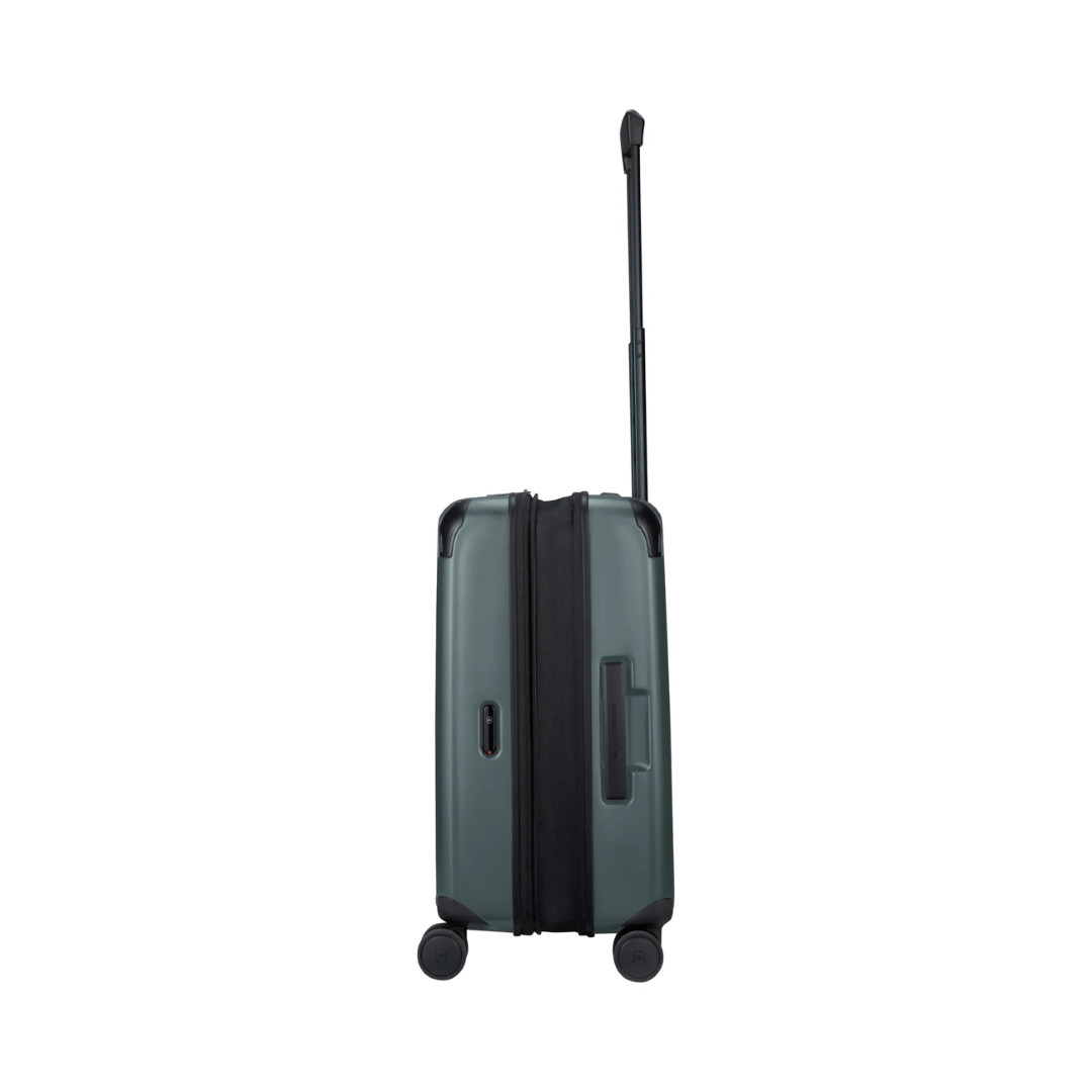 Green hardside carry-on suitcase made from recycled polycarbonate with expandable capacity and quick-access front compartment.