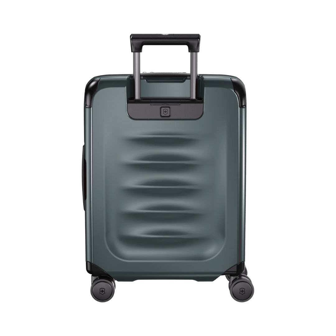 Compact green travel case made from recycled polycarbonate, featuring a quick-access compartment and 20% expandable capacity.