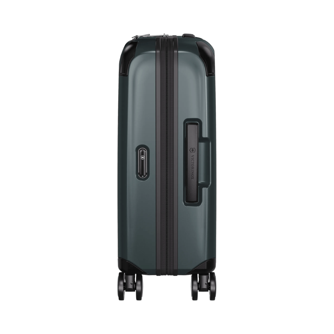 Hardside global carry-on suitcase in green with expandable capacity, lockable front compartment, and durable SORPLAS™ material.