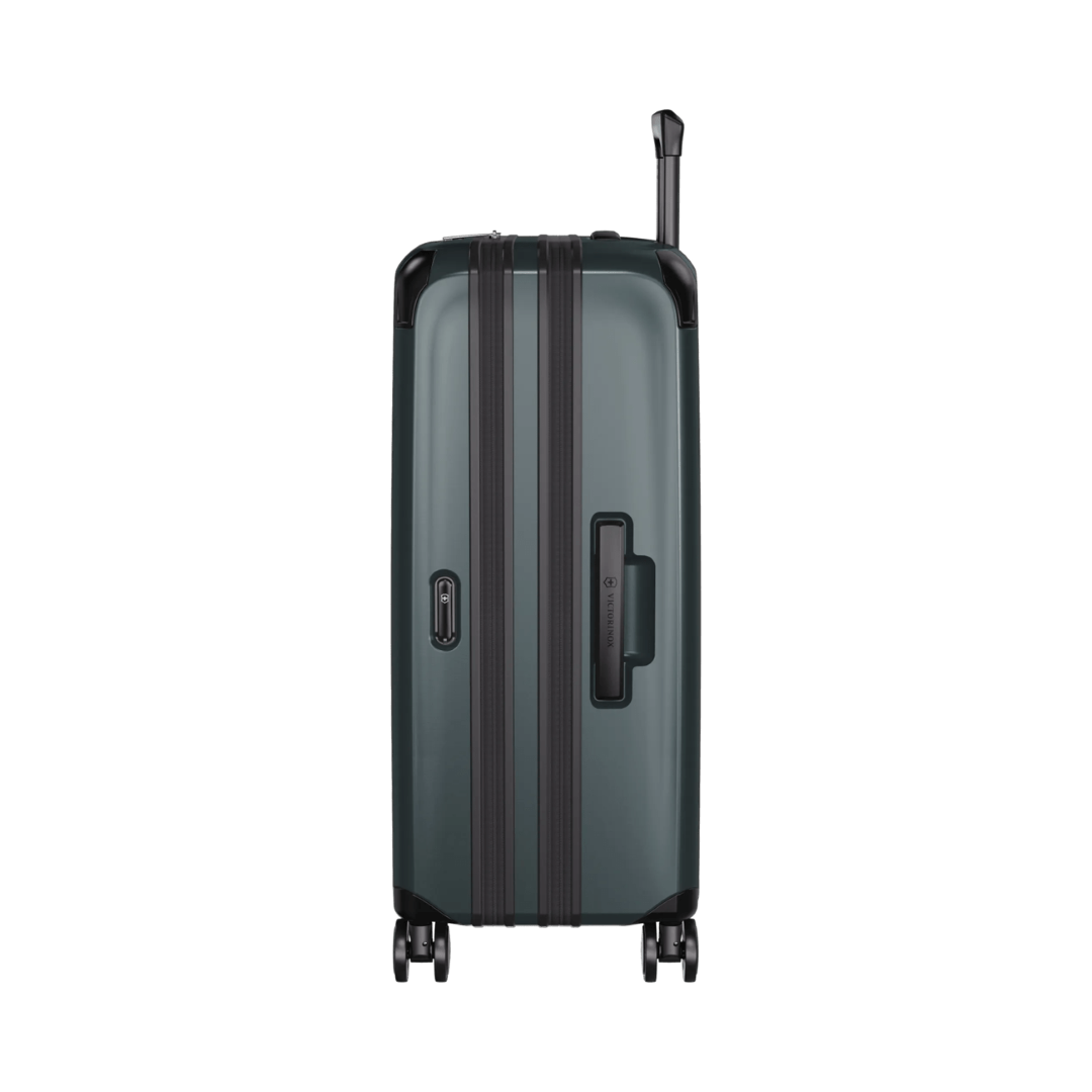 Hardside travel case in Storm color, made from recycled polycarbonate, expandable by 40%, features 8 wheels for easy maneuverability.