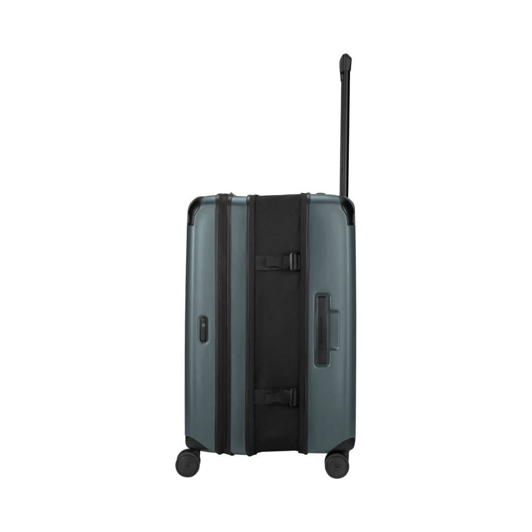 VICTORINOX Spectra 3.0 Medium Hardside Case in Storm, made of recycled polycarbonate, expandable by 40% with 8 wheels for easy travel.