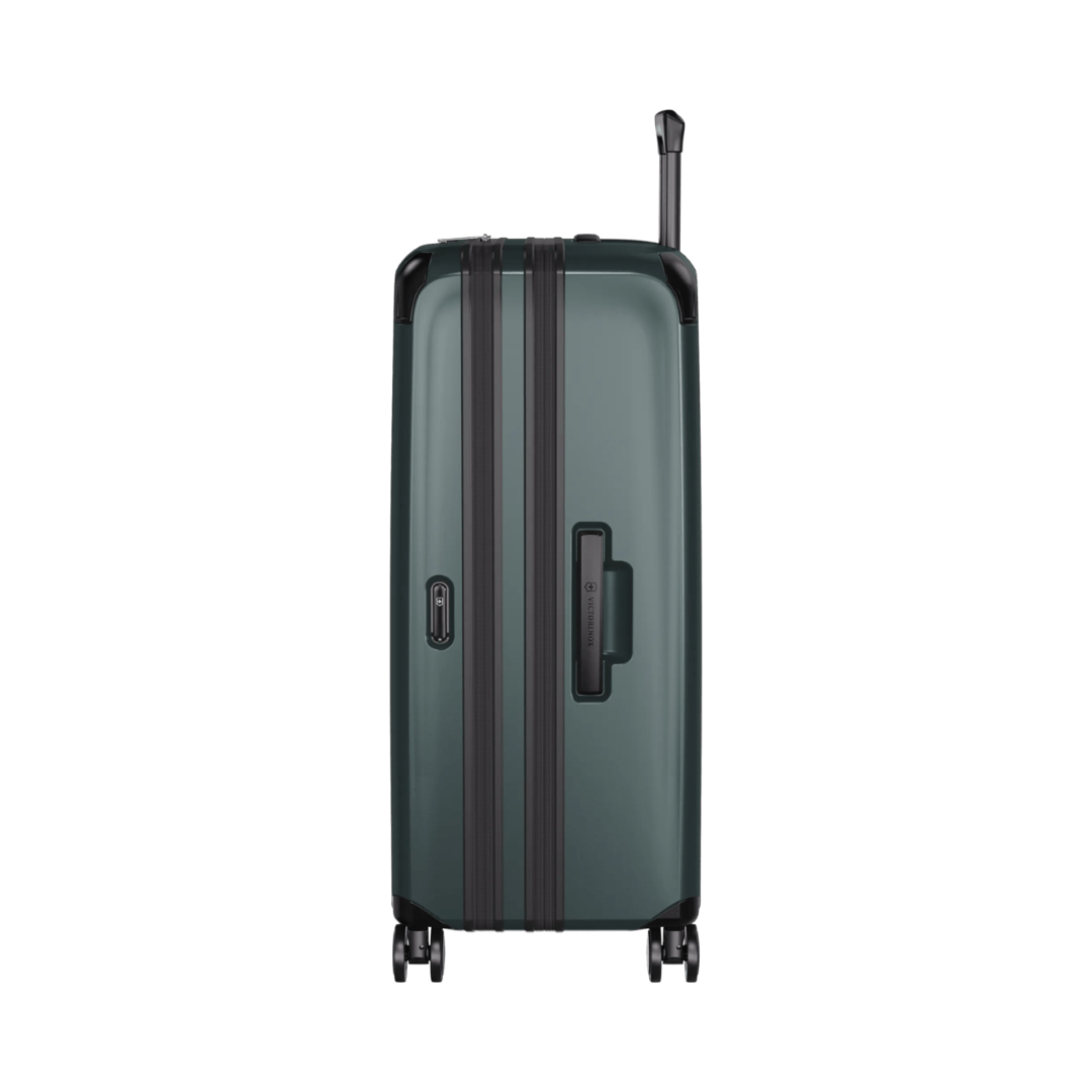 Hardside travel case in Storm color, made from eco-friendly SORPLAS™, expandable with 8 wheels for effortless maneuverability.