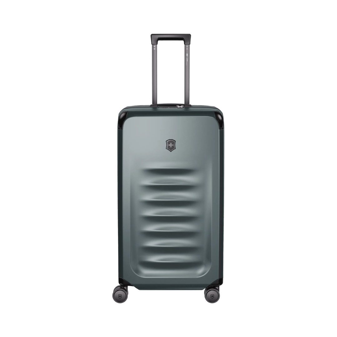 Storm-colored VICTORINOX Spectra 3.0 Large Hardside Trunk featuring durable SORPLAS™, 99L capacity, and smooth 8-wheel mobility.