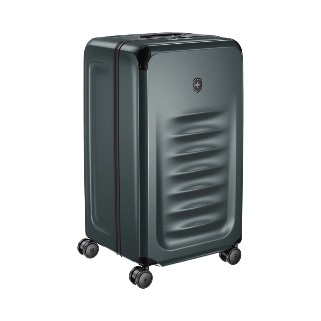 Durable VICTORINOX Spectra 3.0 Hardside Trunk in Storm, offering 99L capacity, smooth 8-wheel spinner, and integrated packing cubes.