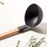 Natural Epicurean Gourmet ladle with heat-resistant nylon head and sturdy handle, featuring a built-in kickstand for mess-free use.