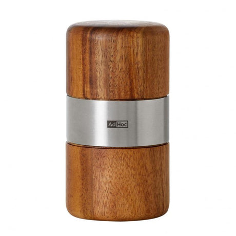 Nutmeg mill in Muskato Brown, 11.3 cm tall, designed for easy grinding and enhancing culinary flavors with style.