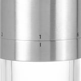 Elegant manual coffee grinder in stainless steel and acrylic, featuring adjustable grind settings for fresh coffee preparation.