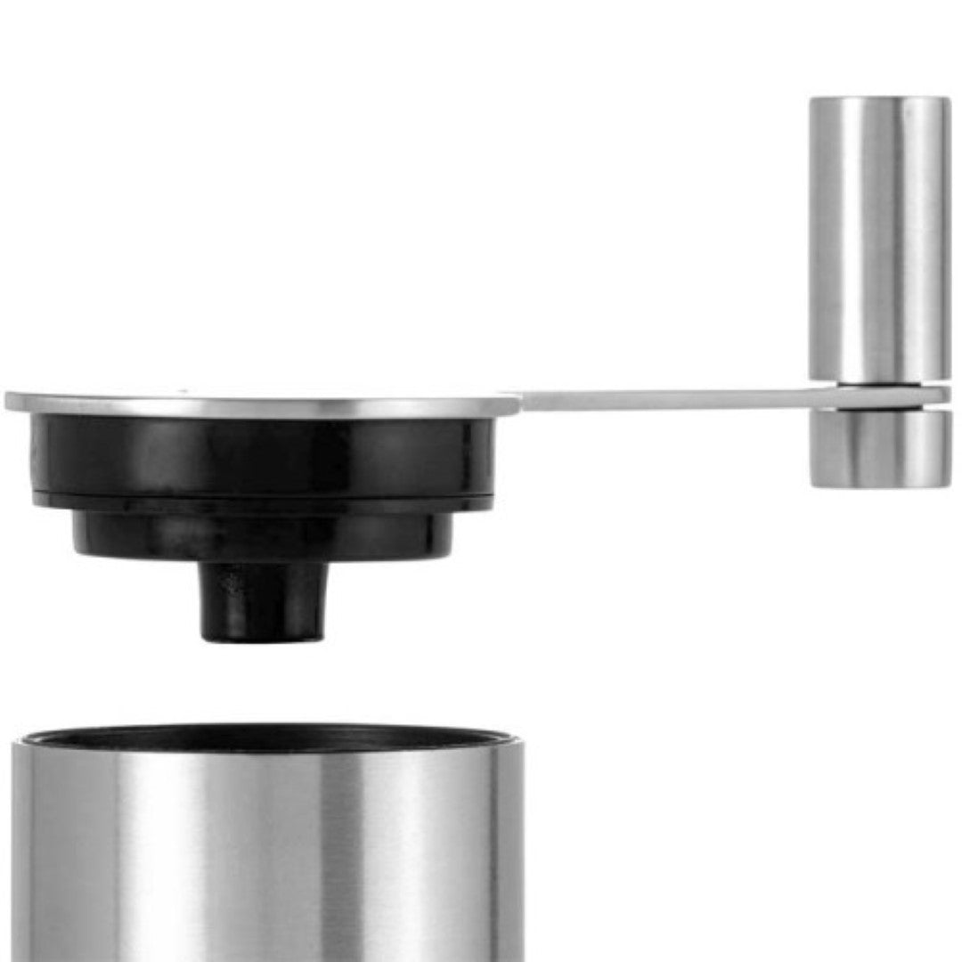 Elegant stainless steel coffee grinder with manual crank, adjustable grind levels, and sleek design for effortless coffee preparation.