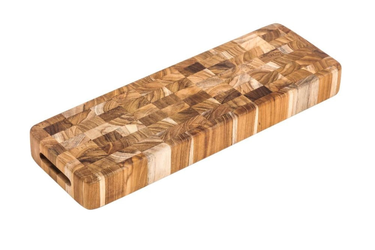 Long teak butcher block cutting board, 46 x 15 x 5.1cm, ideal for food prep and elegant serving.