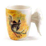 Ceramic mug with angel wings handle, 350ml capacity, elegant design for hot beverages, non-microwave safe.