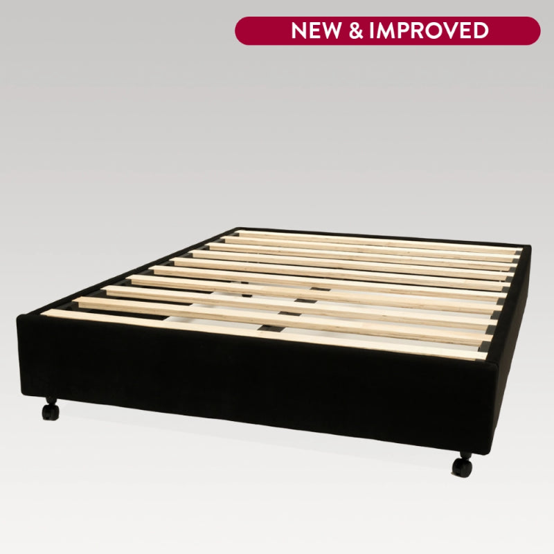 Sleek black microsuede commercial bed base with plywood slats, designed for durability and easy assembly in hospitality settings.