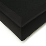 Black padded microsuede bed base with strong plywood slats, designed for commercial use; easy assembly and customizable colors.