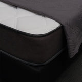 Top Mattress featuring a pocket coil spring system for full-body support and plush comfort in a medium-soft profile.