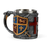 Decorative tankard with gold and silver coat of arms design, 17cm tall, made of resin and stainless steel, for display only.