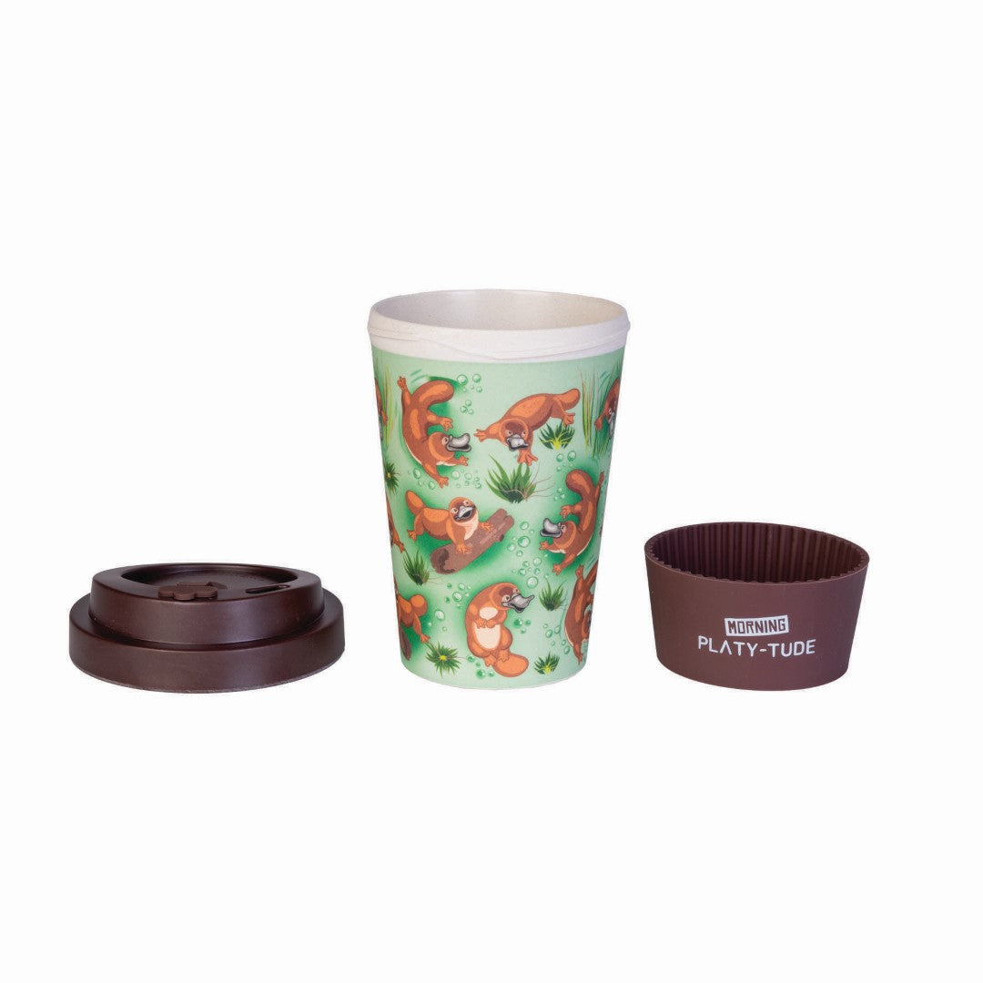 Eco-friendly bamboo cup featuring playful platypuses, BPA-free, dishwasher safe, with an anti-spill lid and silicone band.