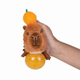 Set of 12 soft plush balls featuring capybaras with orange hats, perfect for stress relief and colorful decor.