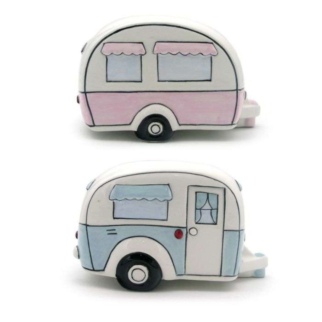 Ceramic money box set featuring whimsical caravan designs, perfect for saving change and enhancing home decor.