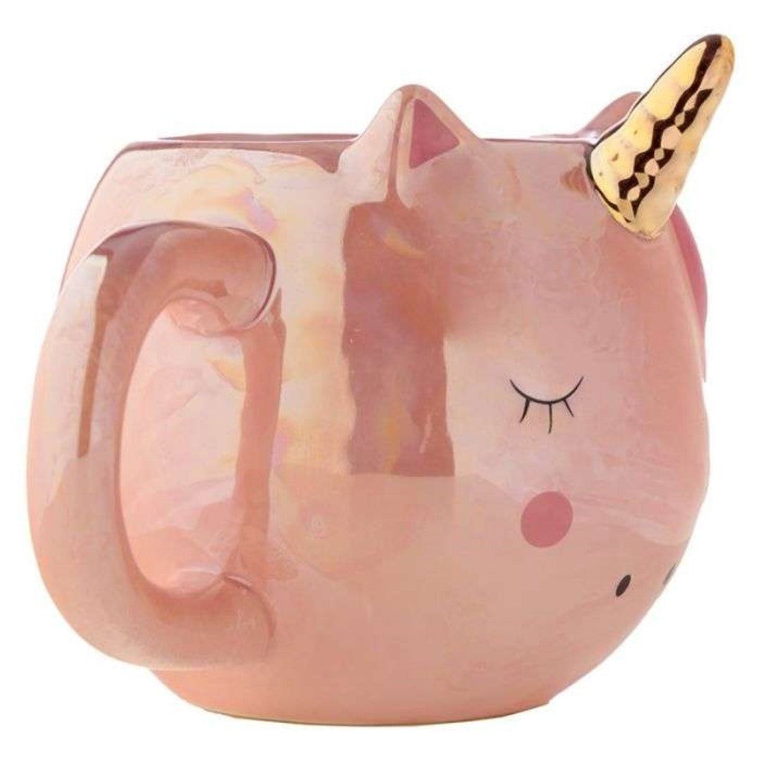 Whimsical unicorn-shaped ceramic mug (560ml) with rainbow design, perfect for hot beverages and decorative use.