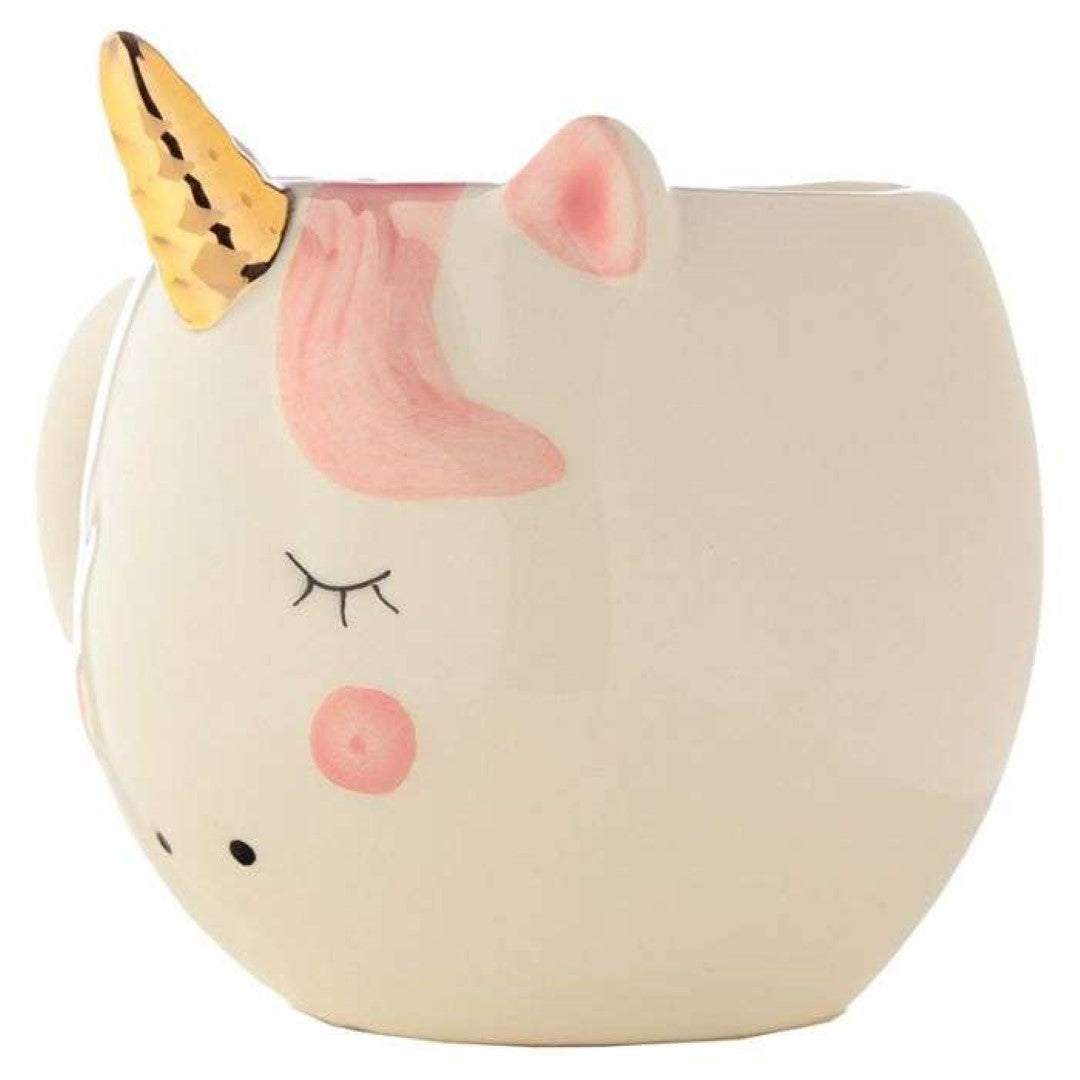 Whimsical unicorn-shaped ceramic mug (560ml) with rainbow design, perfect for magical mornings and unique decor.